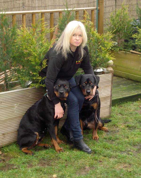 Anita Foster with her two Rottweillers